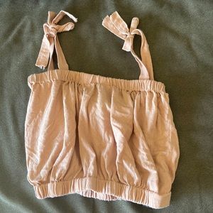 Very cute light pink crop top for teens and young adults.